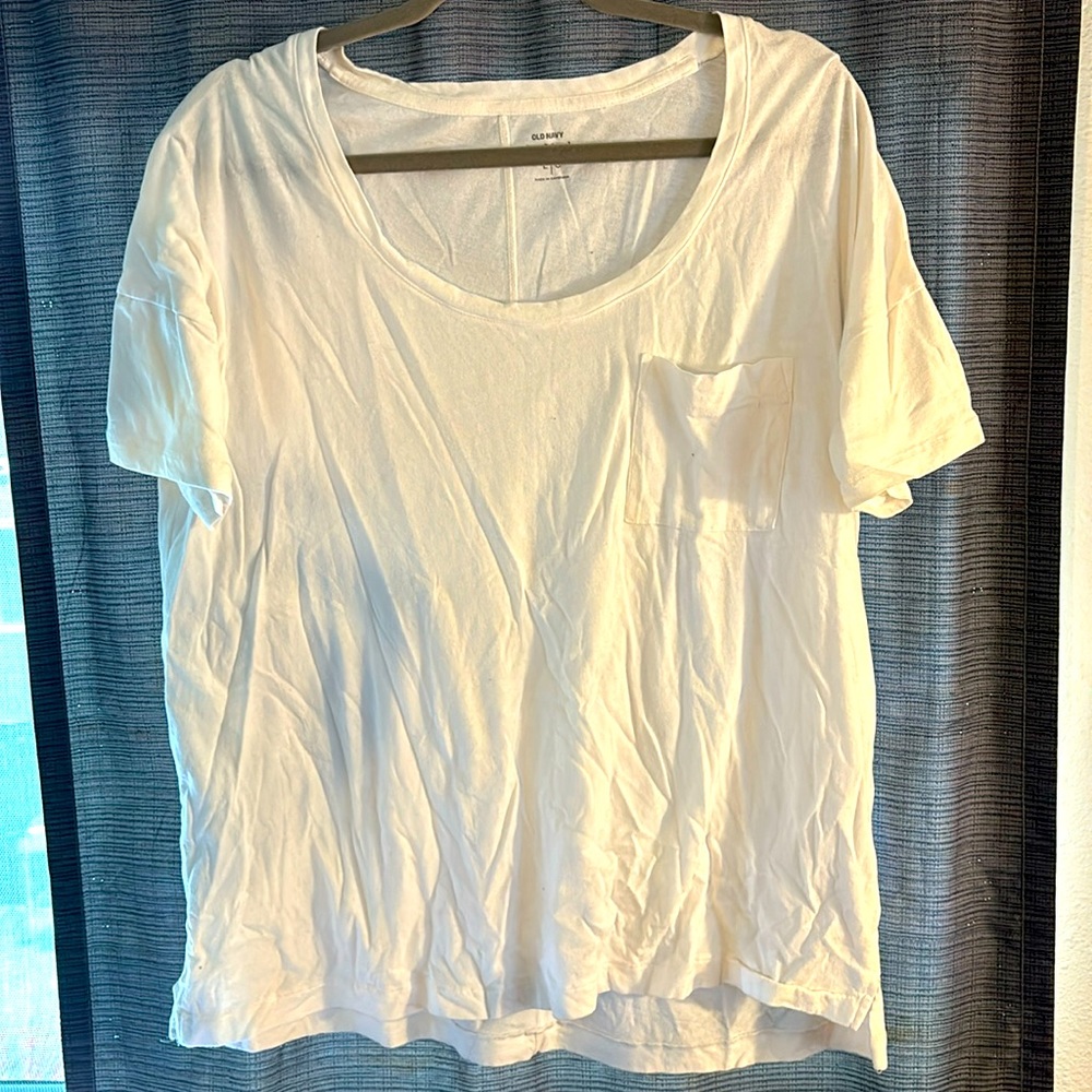 White crew neck tee with front left chest pocket